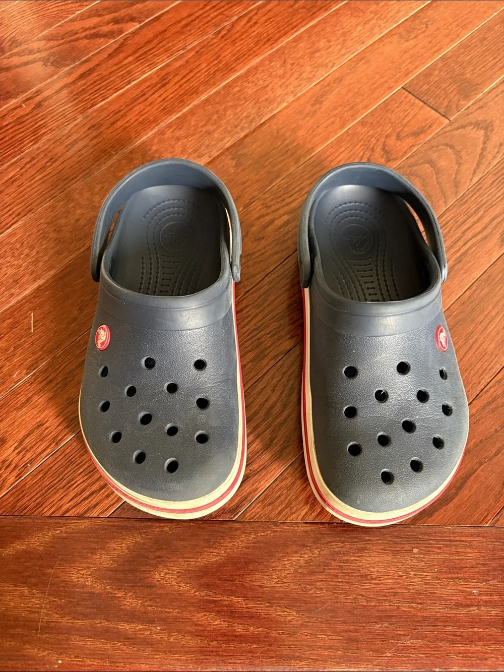 CROCS Kids Navy Clogs with Red and White Trim